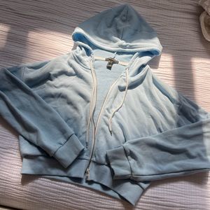 Blue zip up jacket cropped
